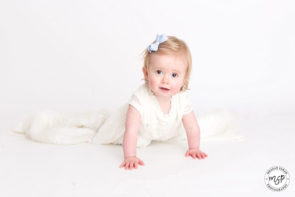 Esme toddler photoshoot by photographer Meagan, white background, studio, Horsforth