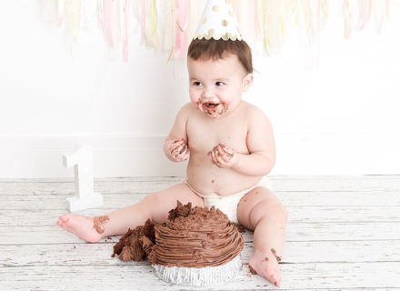 Photo of baby Zara Cake Smash Photography, Leeds. By Meagan Sarah Photography
