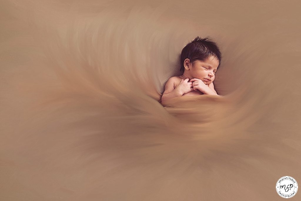 Paint effect newborn photography with brown background