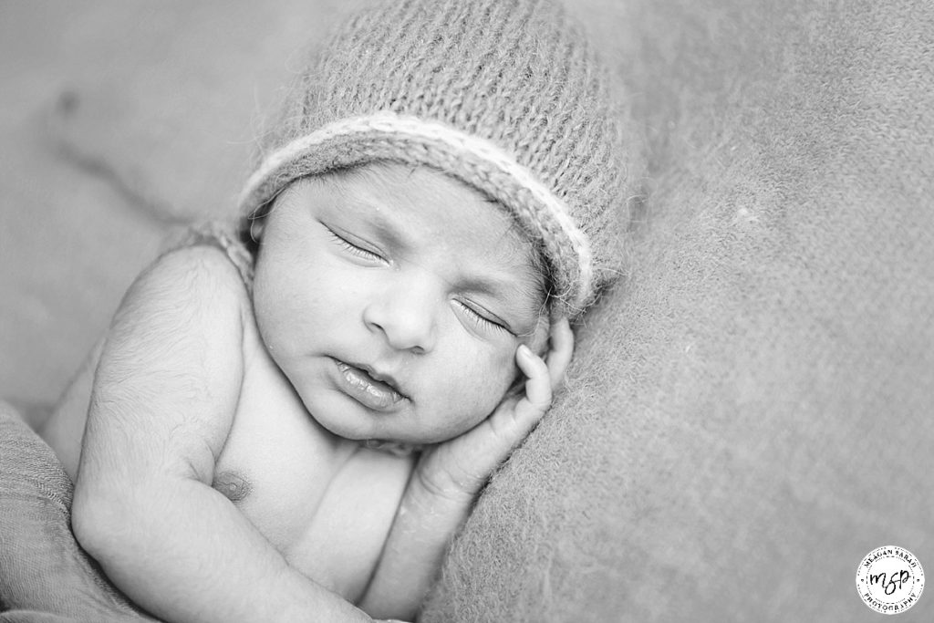 Newborn baby in black and white