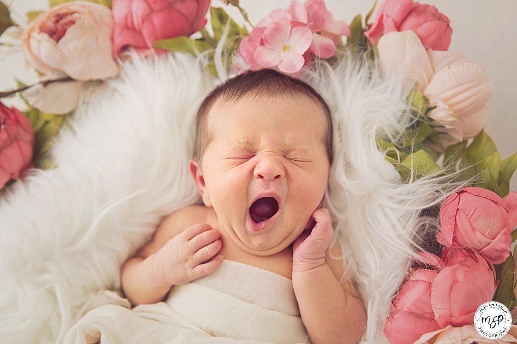 Yawning baby girl photography