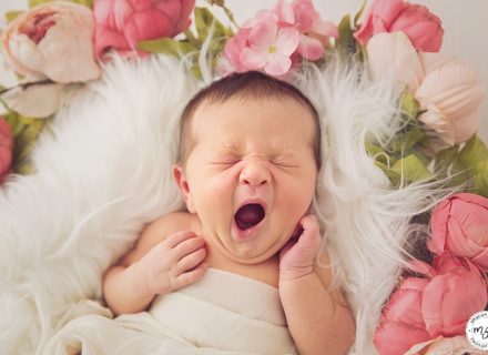 Yawning baby girl photography