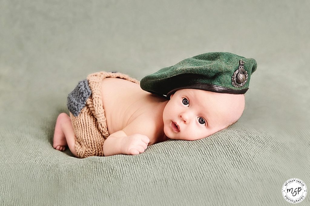 Little newborn Baby Ruben supporting Royal Marines