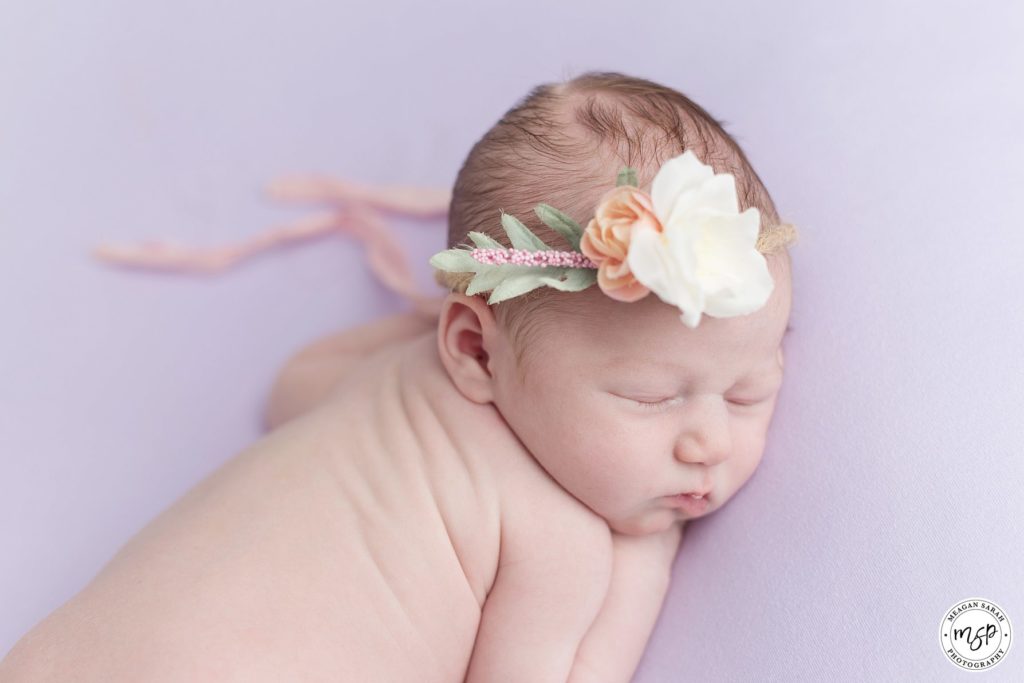 Newborn Ella on Lilac Background