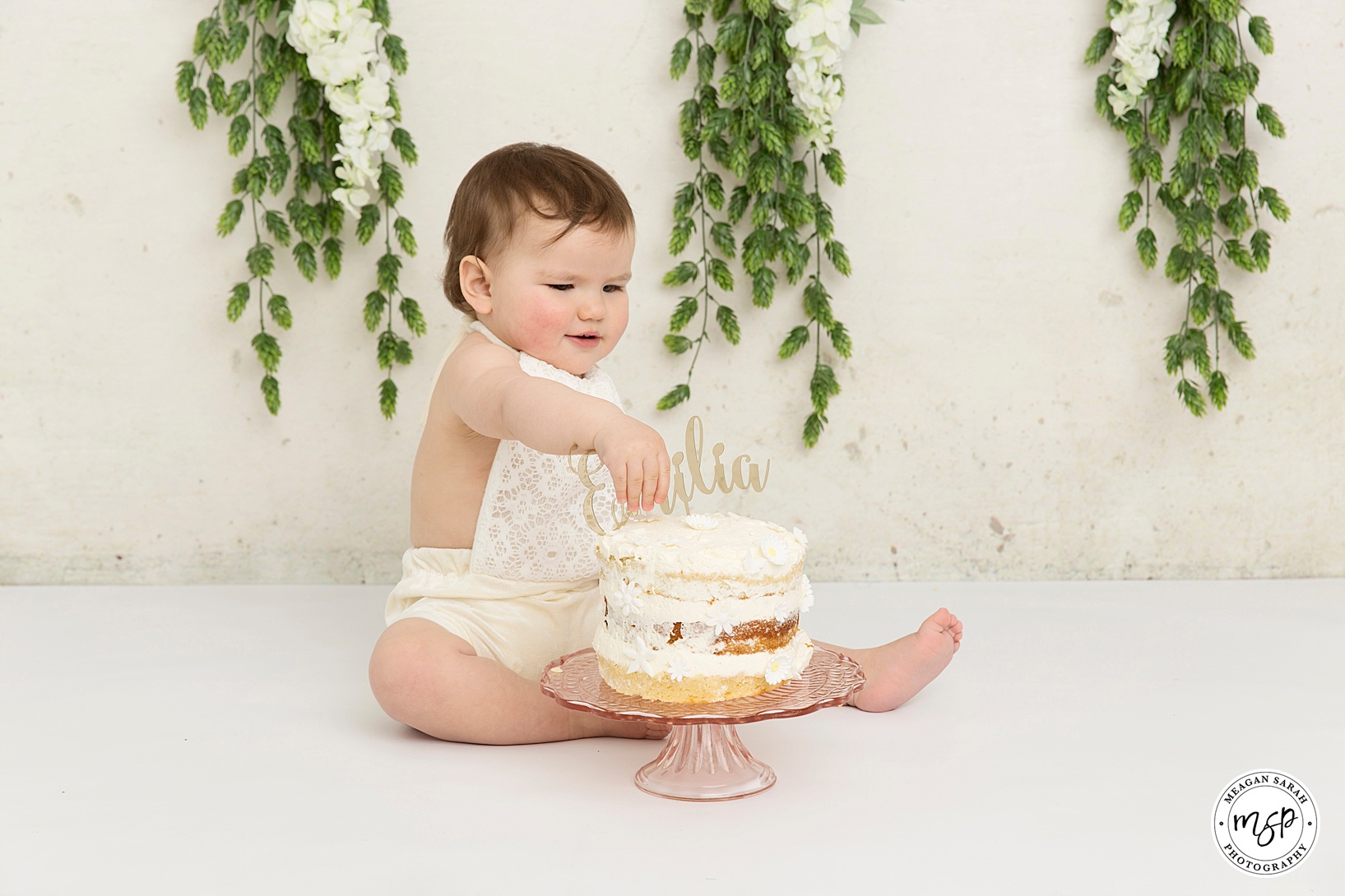 Bash the Cake,Birthday,Birthday Fun,Bunting.,Cake,Cake Smash,Cake Smash Backgrounds,Cake Smash Photo Shoot,Cake Smash Photographer,Cake Smash Set,Children,Floral,Leeds Cake Smashes,Little Girl,Meagan Sarah Photography,Messy,One Year Old,Photo Fun,babies,