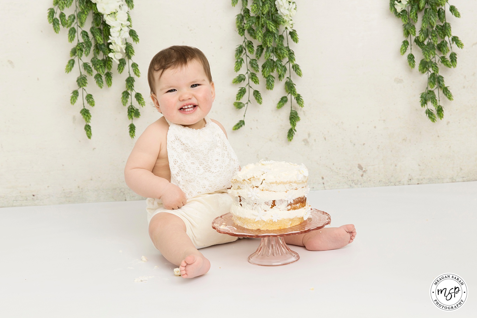 Bash the Cake,Birthday,Birthday Fun,Bunting.,Cake,Cake Smash,Cake Smash Backgrounds,Cake Smash Photo Shoot,Cake Smash Photographer,Cake Smash Set,Children,Floral,Leeds Cake Smashes,Little Girl,Meagan Sarah Photography,Messy,One Year Old,Photo Fun,babies,