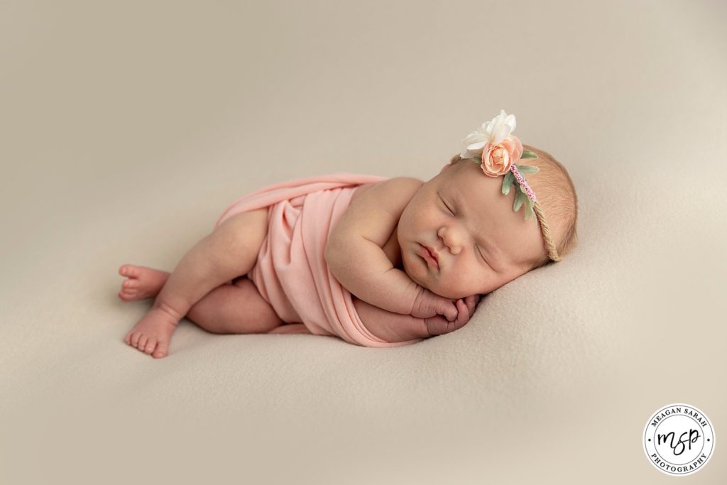beautiful baby newborn girl photography in peach