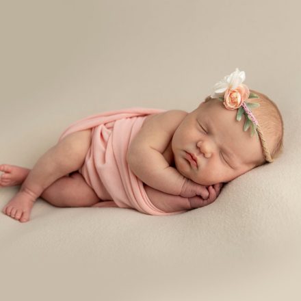 beautiful baby newborn girl photography in peach