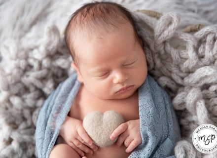Baby newborn holding felt heart, photoshoot, Leeds, newborn photographer,
