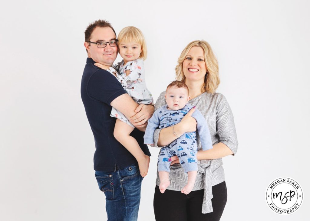 Family pictures in a studio with white background