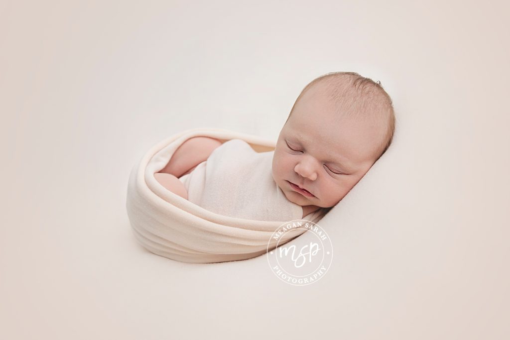 baby photograph in peach background