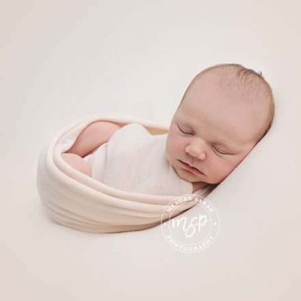 baby photograph in peach background