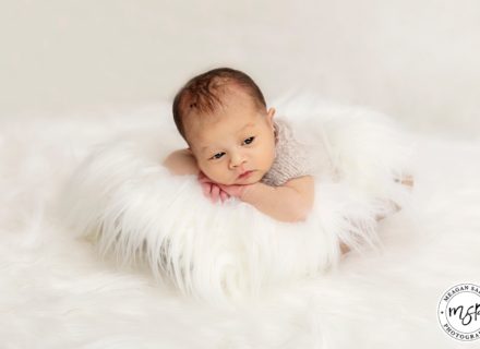 Newborn baby photographer Leeds, white fur, cute baby,