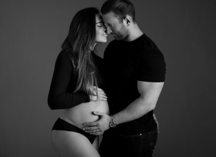 Pregnant couple embrace for the maternity photo shoot in Leeds.
